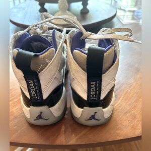 Jordan Jump man Basketball Shoes. Youth size 7. White, black and purple.
